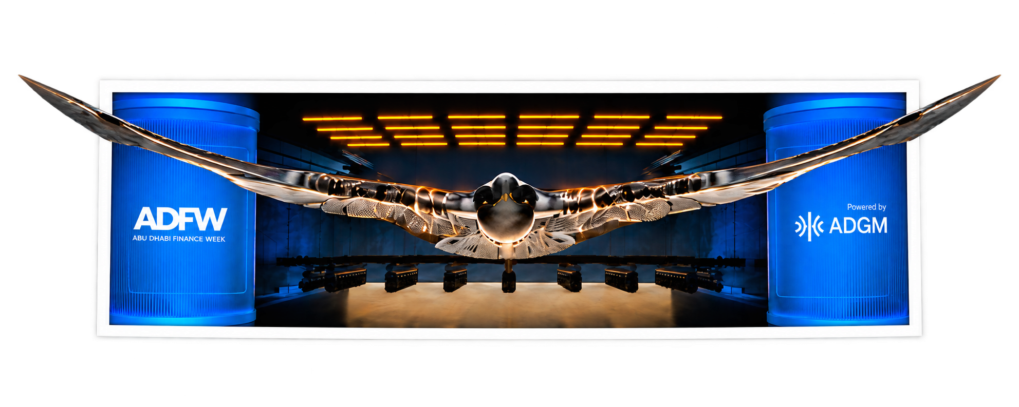 The ADFW falcon flying beyond both edges of a stage photograph, adapted from the approved LinkedIn banner